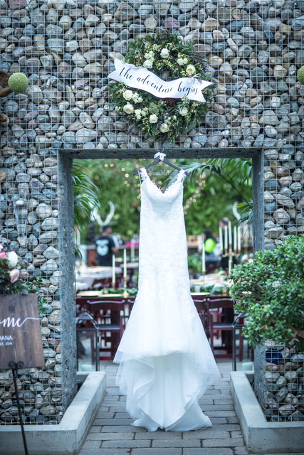 Wedding dress hung at venue