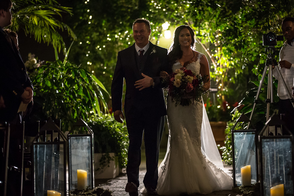 Bride being walked down the isle